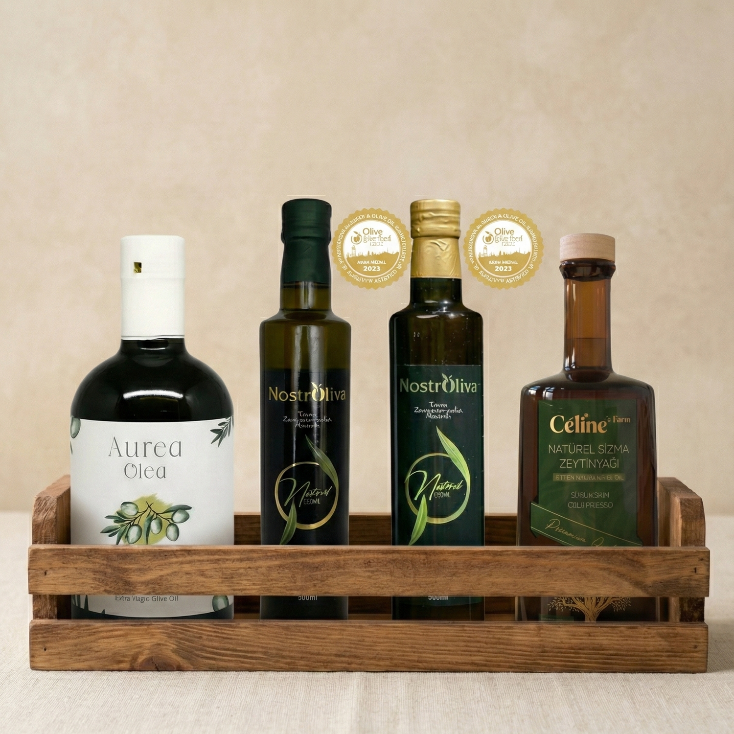Olive oil tasting set with four bottles on a wooden tray against a beige background